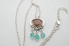 Handmade silver necklace with Copper Rutile and Emerald