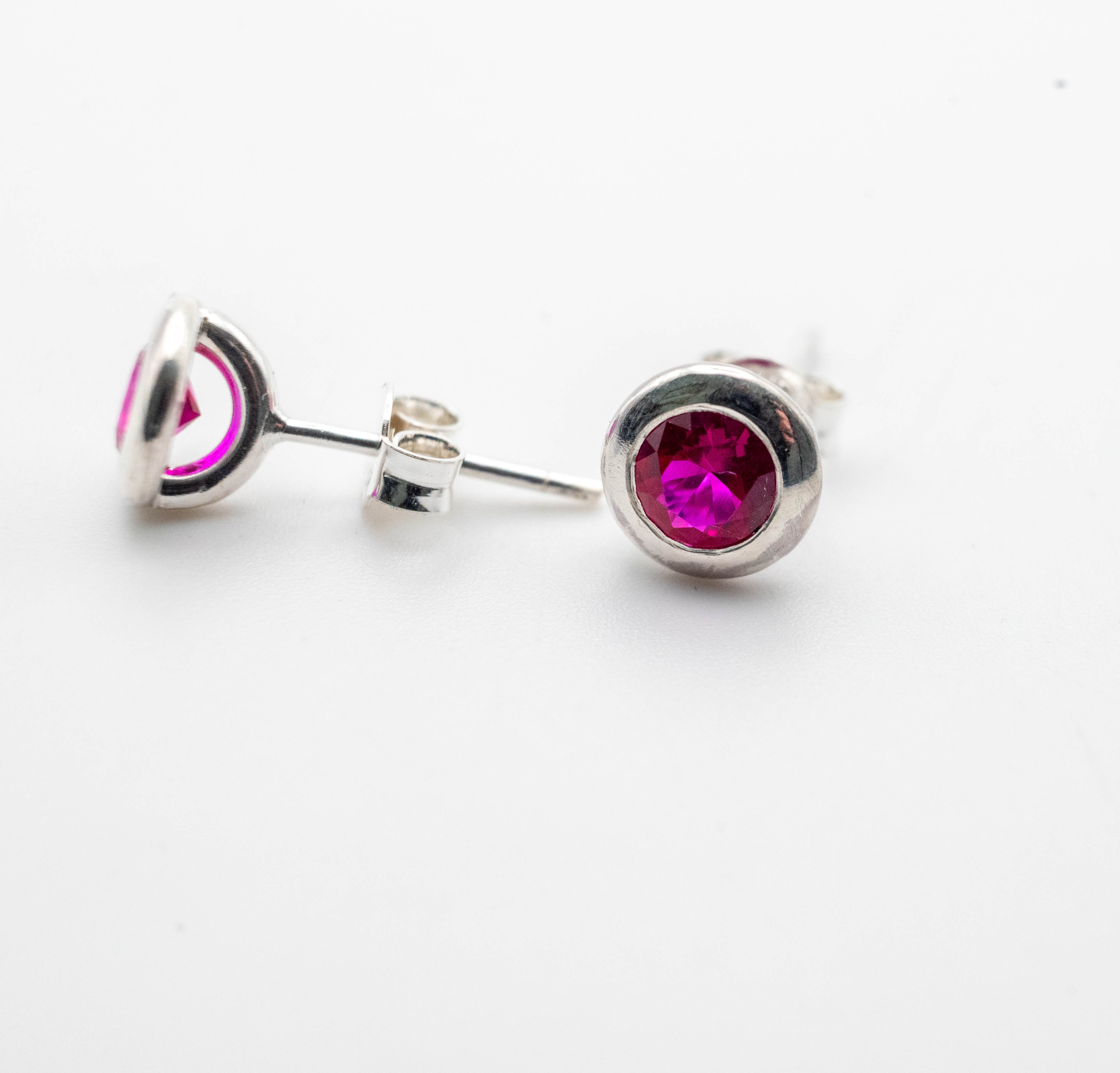 Silver handmade studded earrings with Ruby
