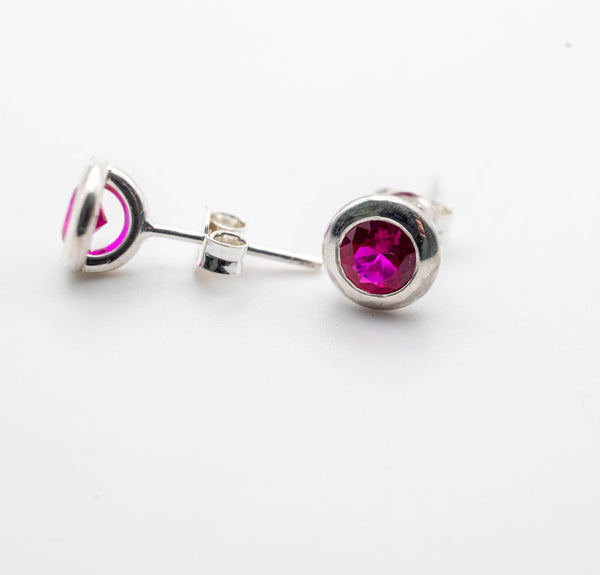 Silver handmade studded earrings with Ruby