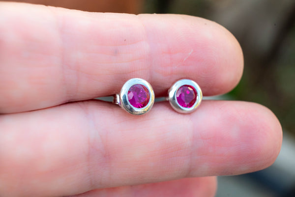 Silver handmade studded earrings with Ruby