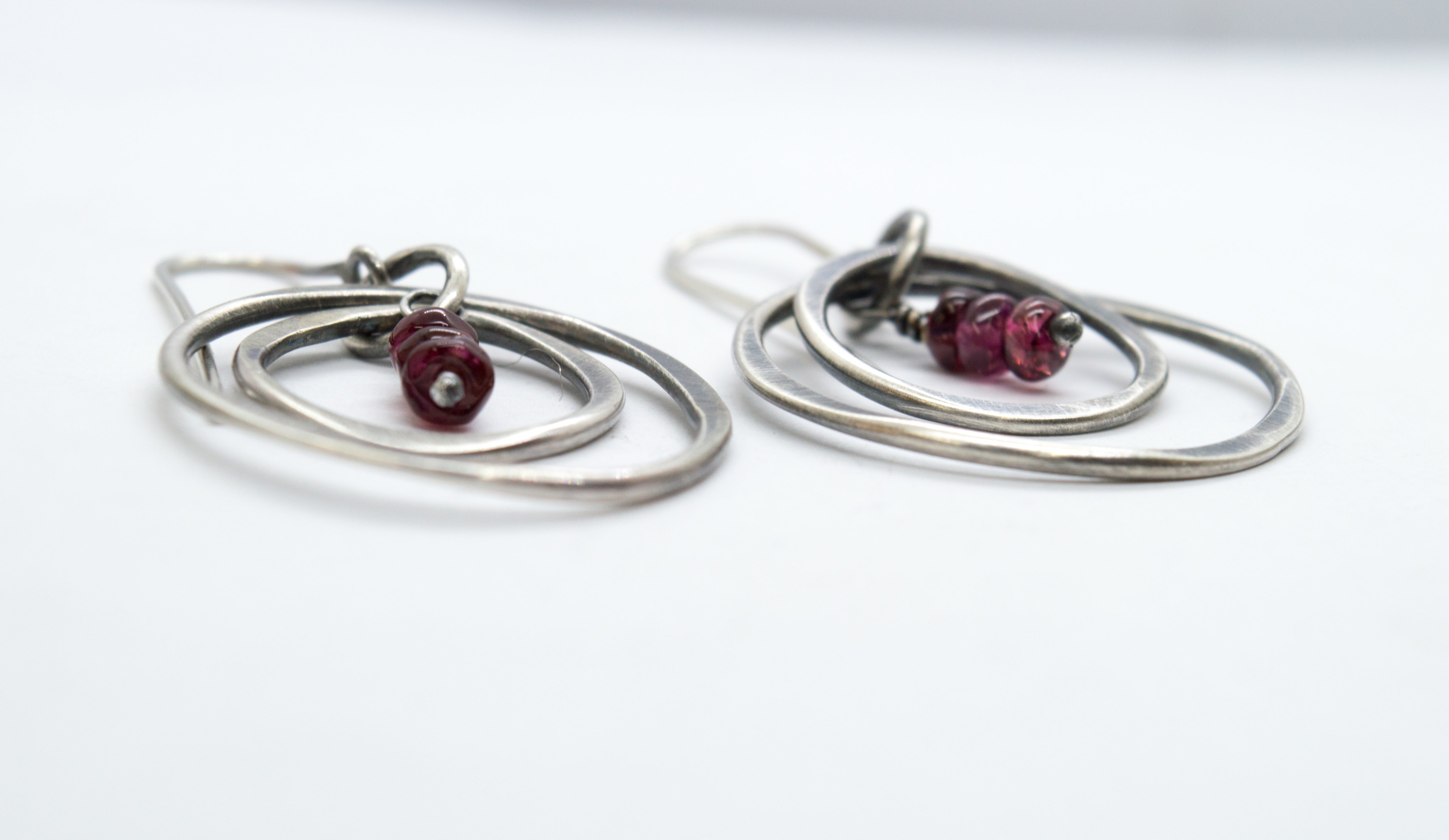 Silver earrings with red garnet