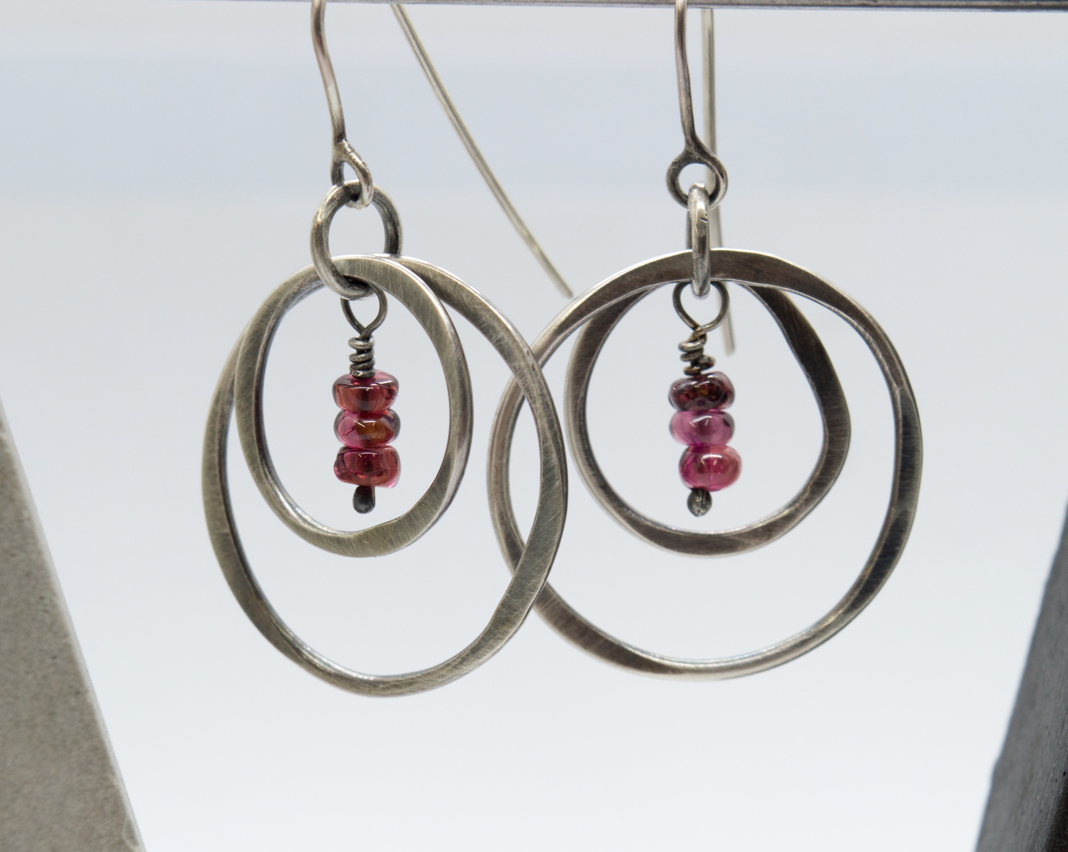 Silver earrings with red garnet