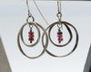 Silver earrings with red garnet