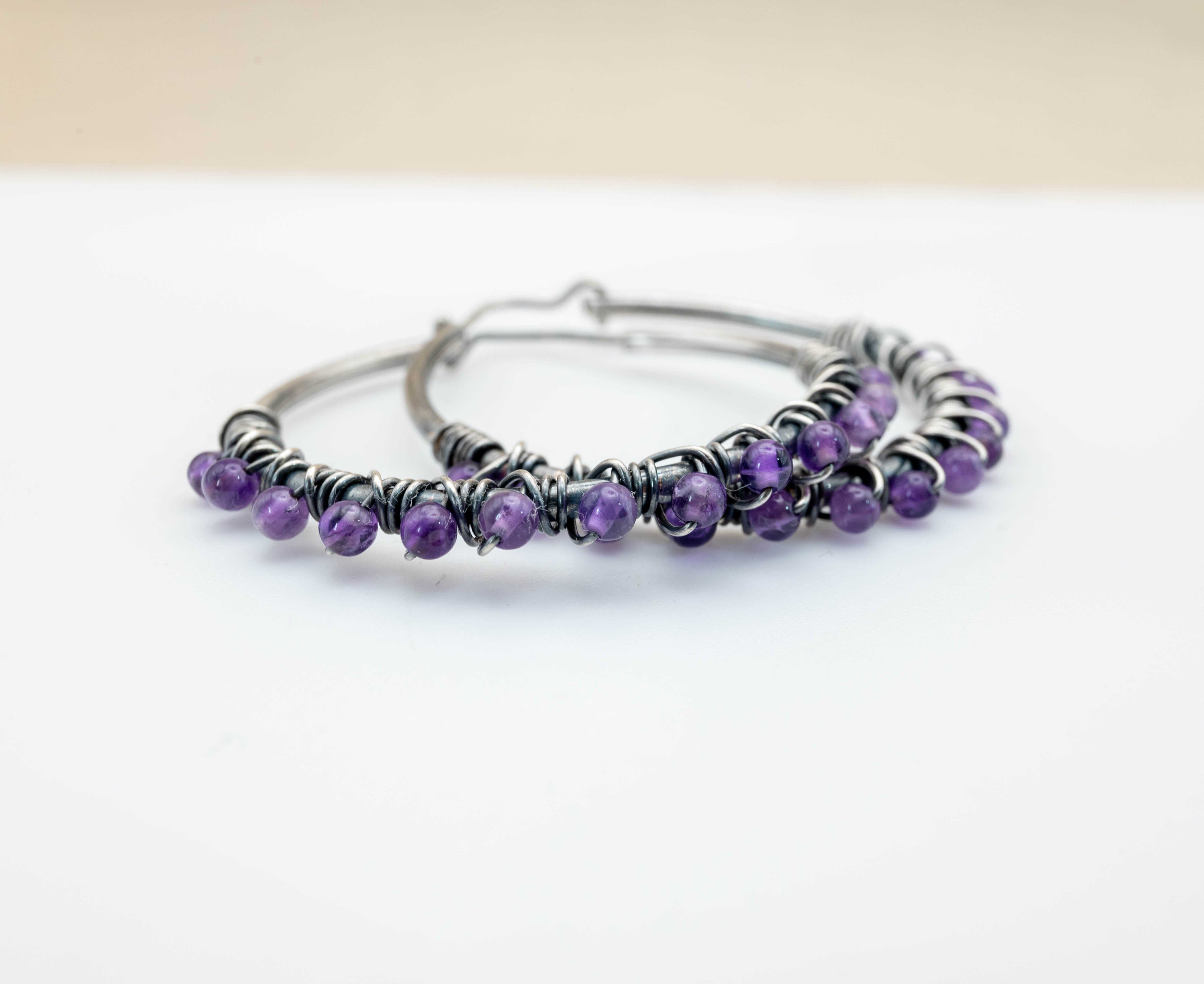 Large silver hoop earrings with Amethyst