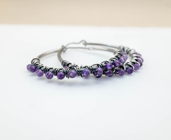 Large silver hoop earrings with Amethyst