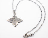 Silver cross with Floral design