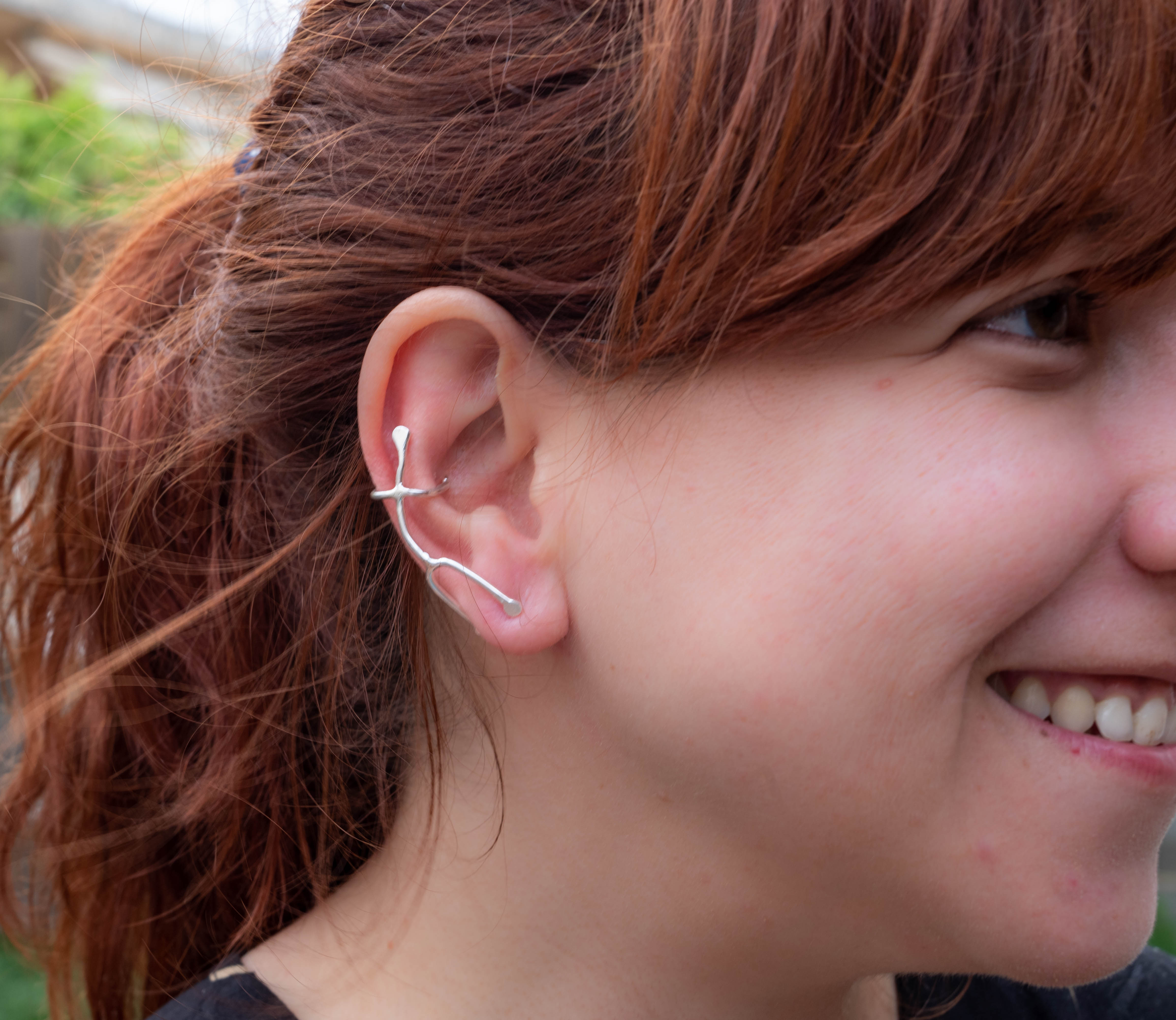 μοντέρνο ασημένιο σκουλαρίκι για όλο το αυτί