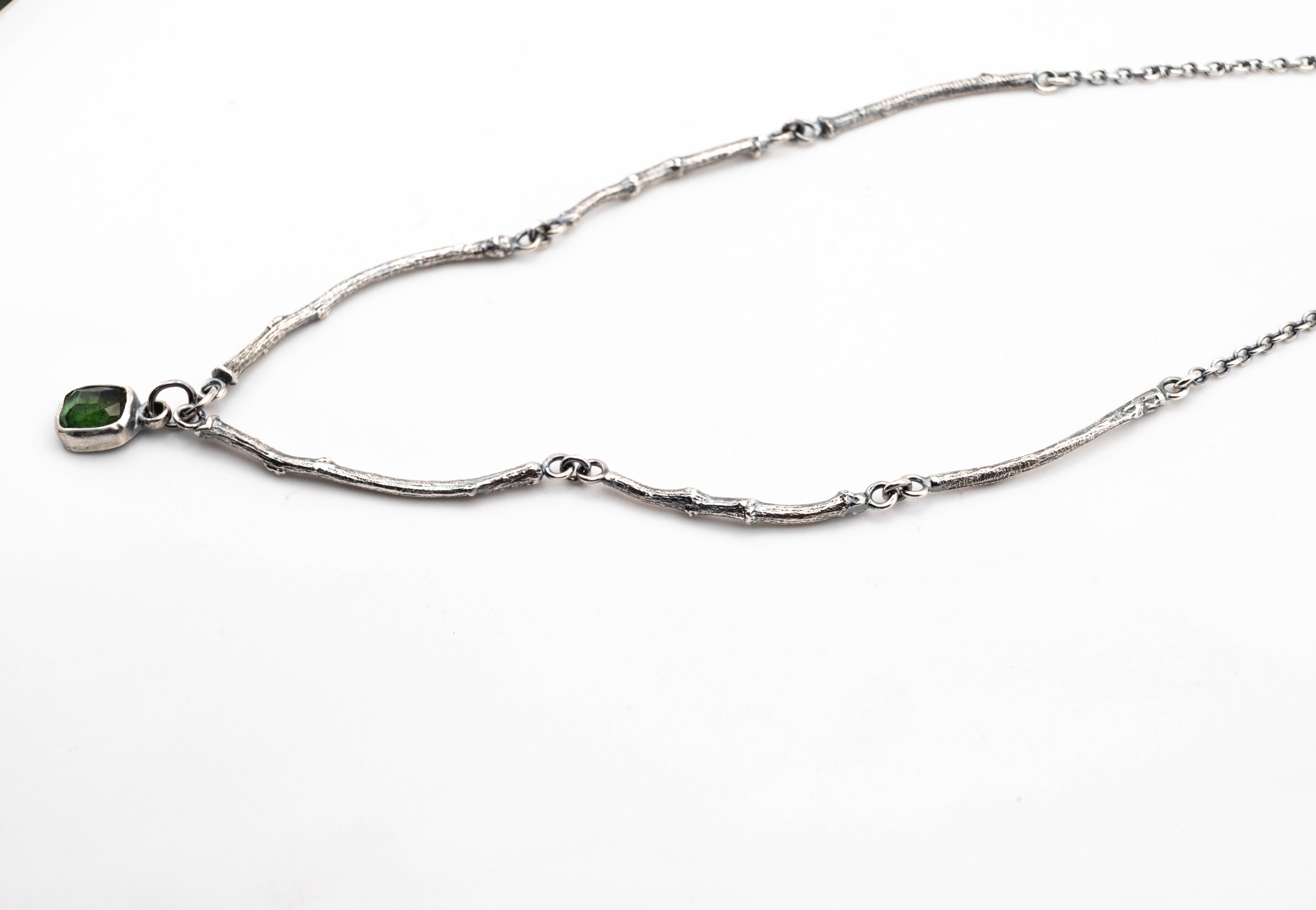 artisan silver necklace with organic leaf and branch texture