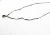 artisan silver necklace with organic leaf and branch texture