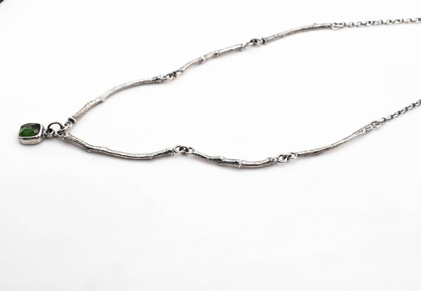 artisan silver necklace with organic leaf and branch texture