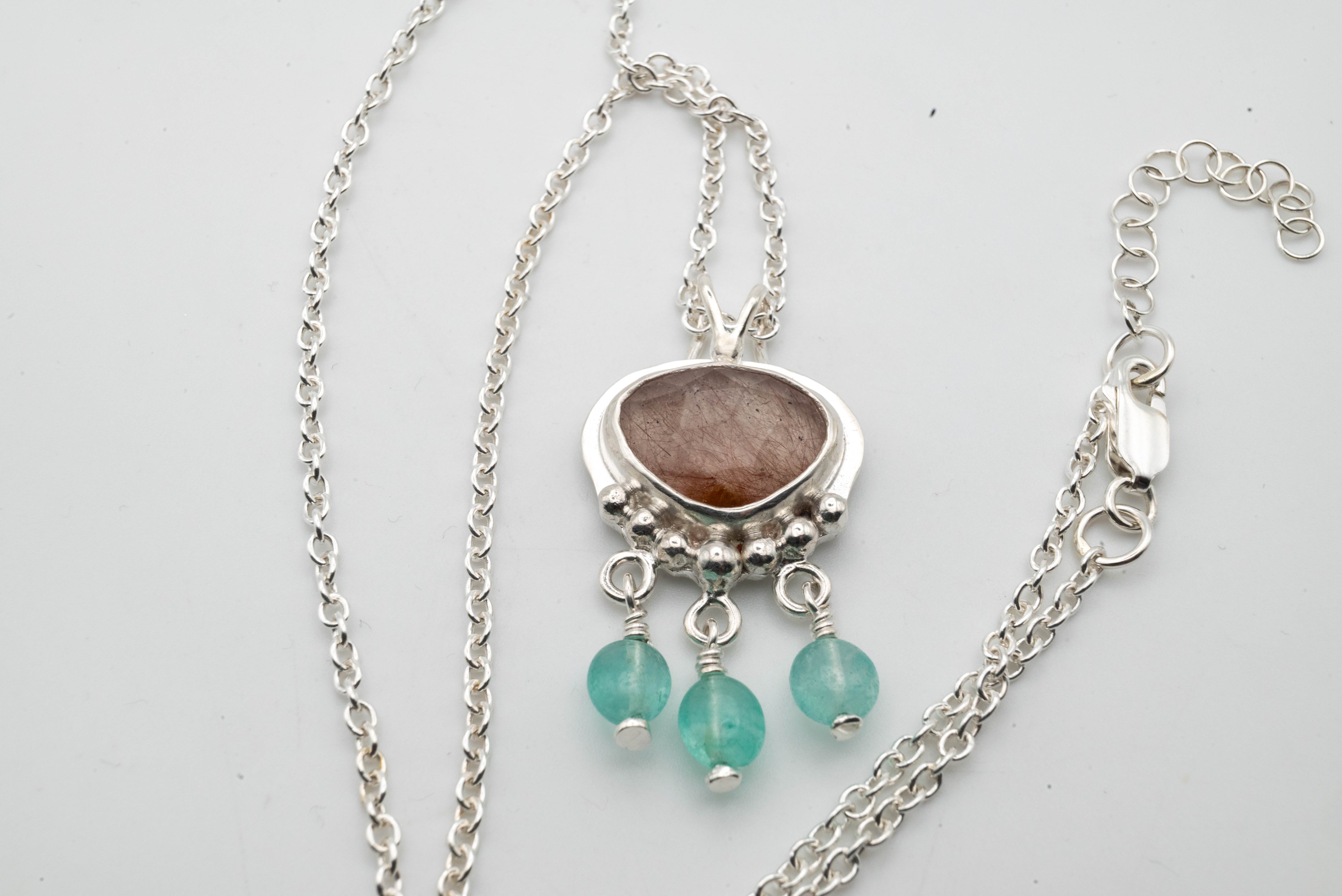 Handmade silver necklace with Copper Rutile and Emerald